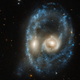 Image for article titled Hubble Spots a Ghoulish 'Face' in the Depths of Space